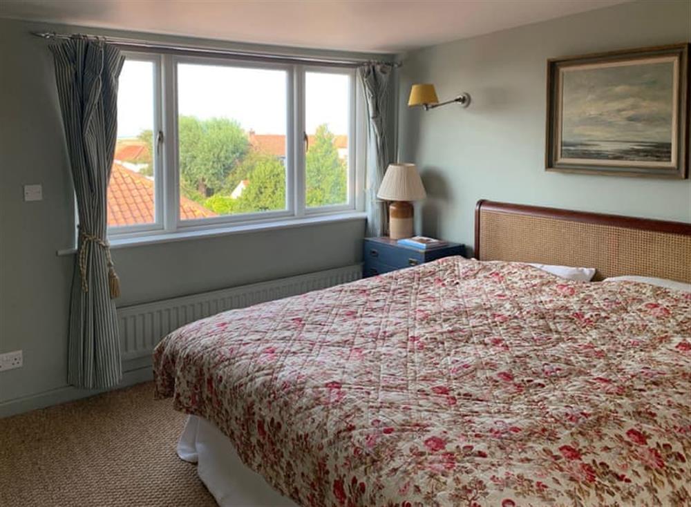 Comfortable master bedroom at Coastguards Cottage in Burnham Overy Staithe, near Burnham Market, Norfolk