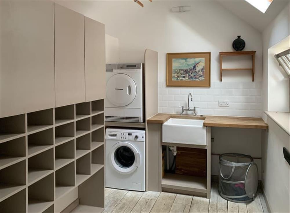 Useful utility room within converted outhouse