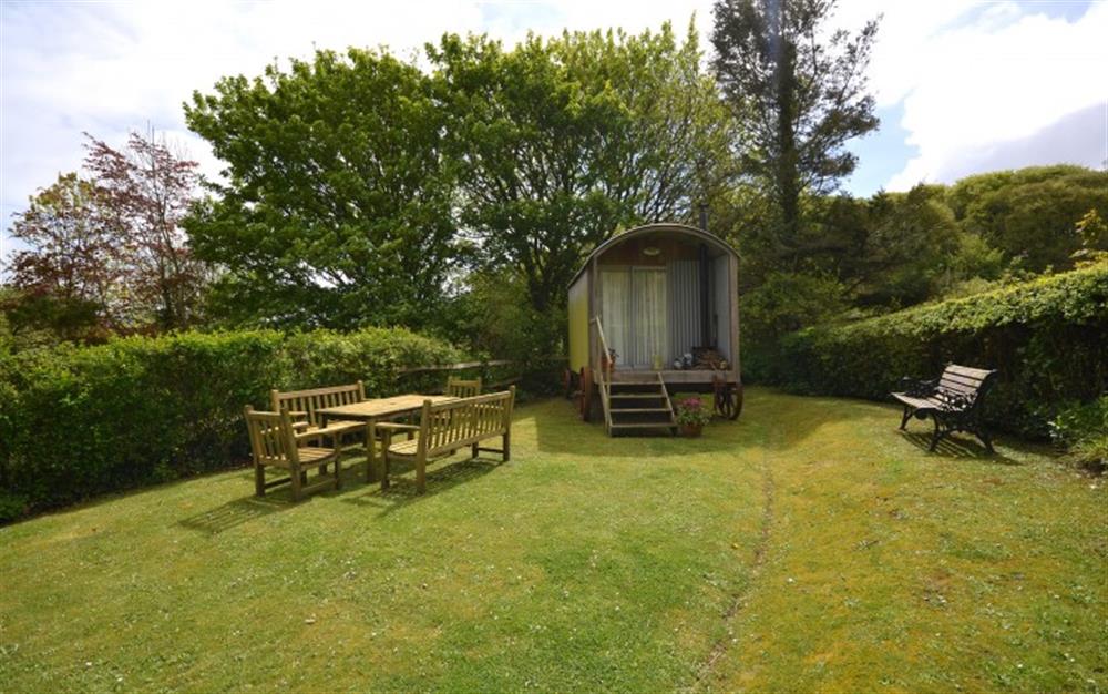Another view of the garden and shepherds hut, at Cob Cottage in Kingsbridge