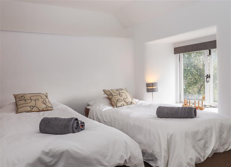 One of the bedrooms at Cob Cottage, Liverton near Bovey Tracey