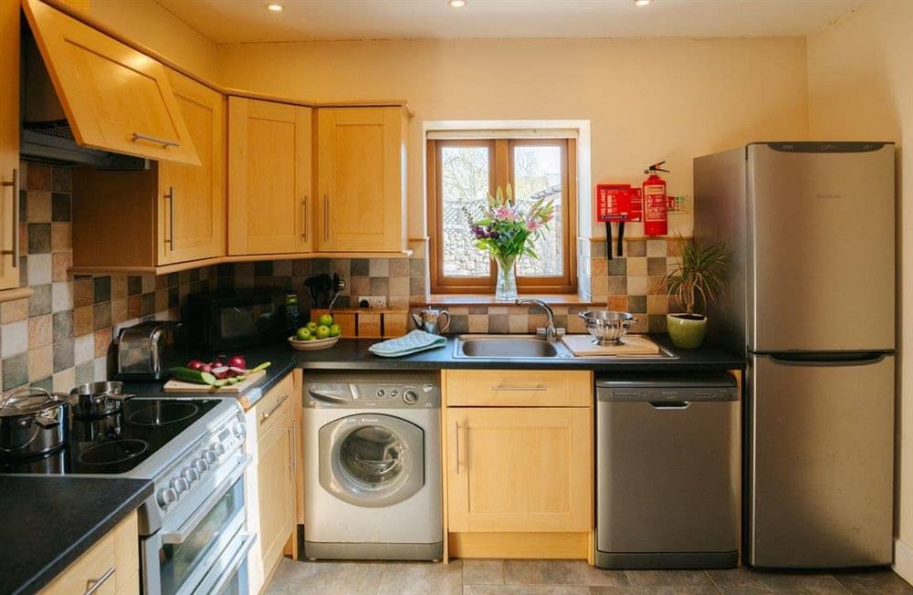This is the kitchen (photo 3) at Cob Cottage in Rhosilli, Swansea, Glamorgan, West Glamorgan