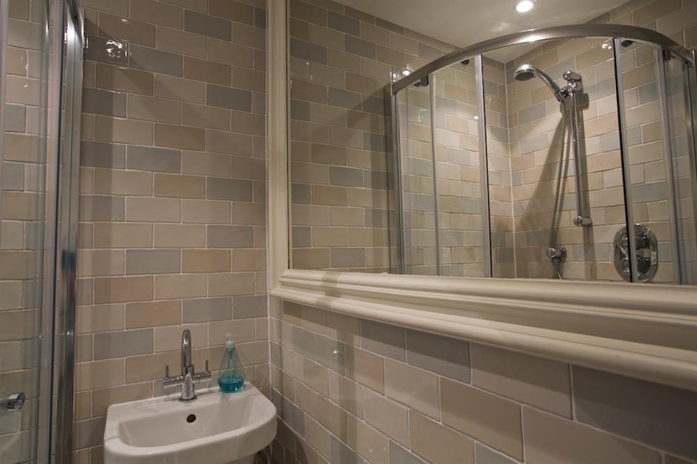 Tiled bathroom with corner shower (photo 2) at Cob Cottage in , Salcombe
