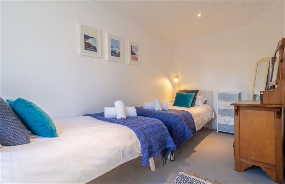 Bedroom two with 3’ twin beds at Cob Cottage, St Agnes