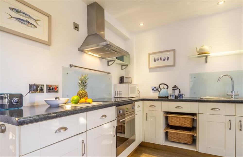 Kitchen with oven, hob, fridge, freezer and microwave at Cob Cottage, St Agnes