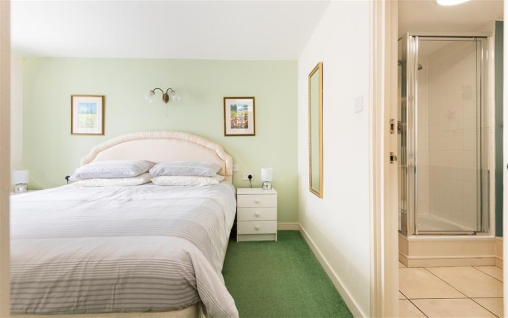 First floor double bedroom with 3ft twin clip and zip linked beds. at Cobb Barn in Thurlestone