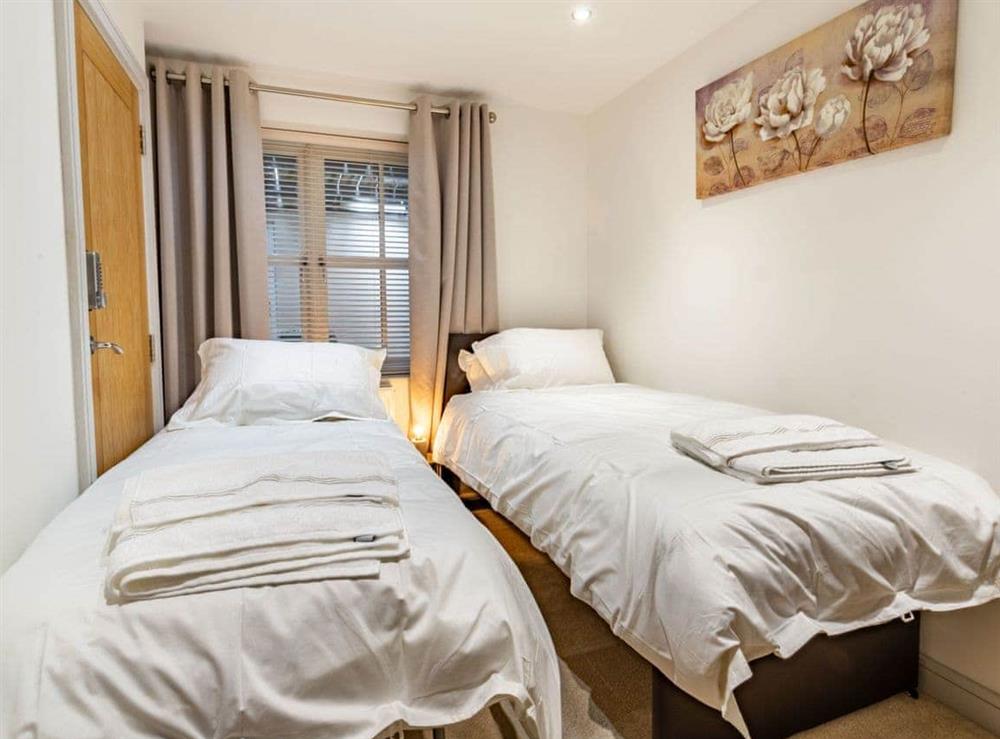 Single bedroom with additional bed at Cobble Cottage in Whitby, North Yorkshire
