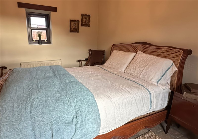 A bedroom in Cobble Stone Cottage at Cobble Stone Cottage, near Leabgarrow