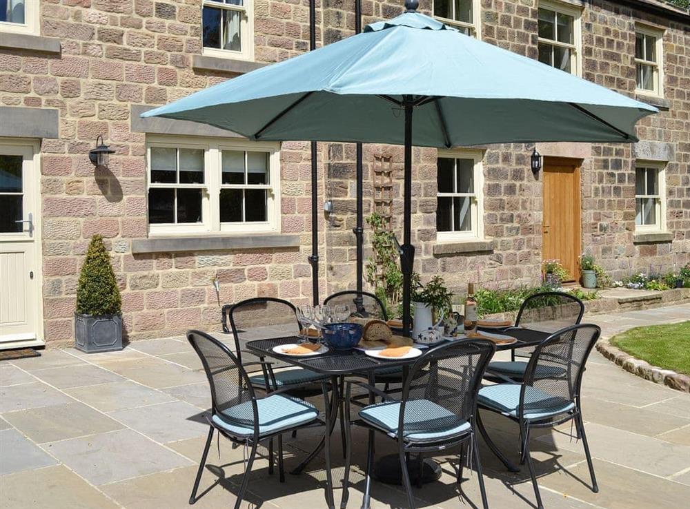 Outdoor dining area at Cobblers Cottage in Ripley, near Harrogate, North Yorkshire
