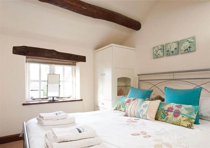 A bedroom in Cobblestone Cottage at Cobblestone Cottage, Ambleside