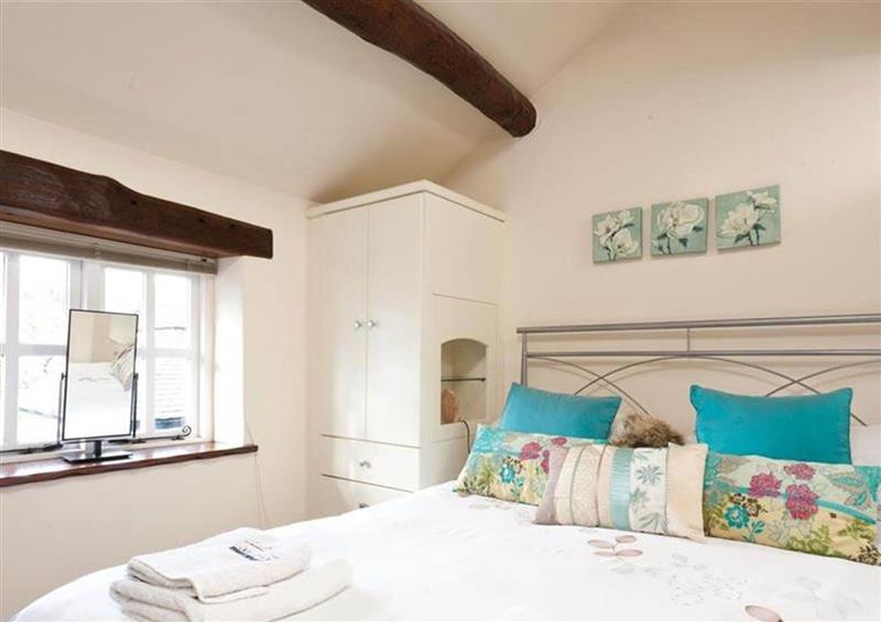 This is the bedroom at Cobblestone Cottage, Ambleside