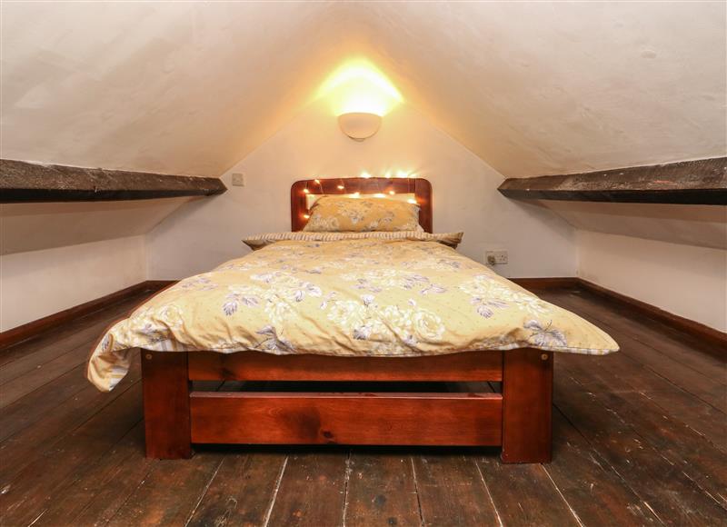 This is a bedroom at Cobwebs Corner, Porthcawl