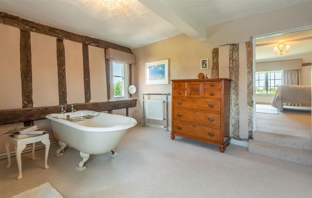 En-suite bathroom with freestanding bath at Cockerells Hall, Buxhall