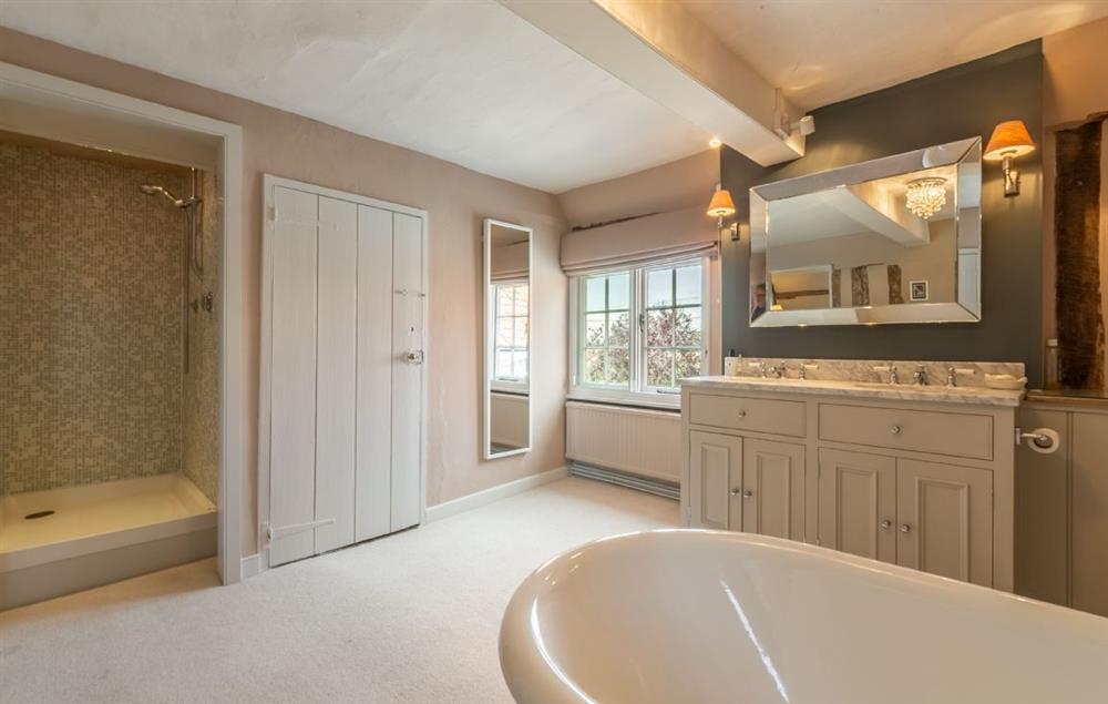 En-suite bathroom with separate shower at Cockerells Hall, Buxhall