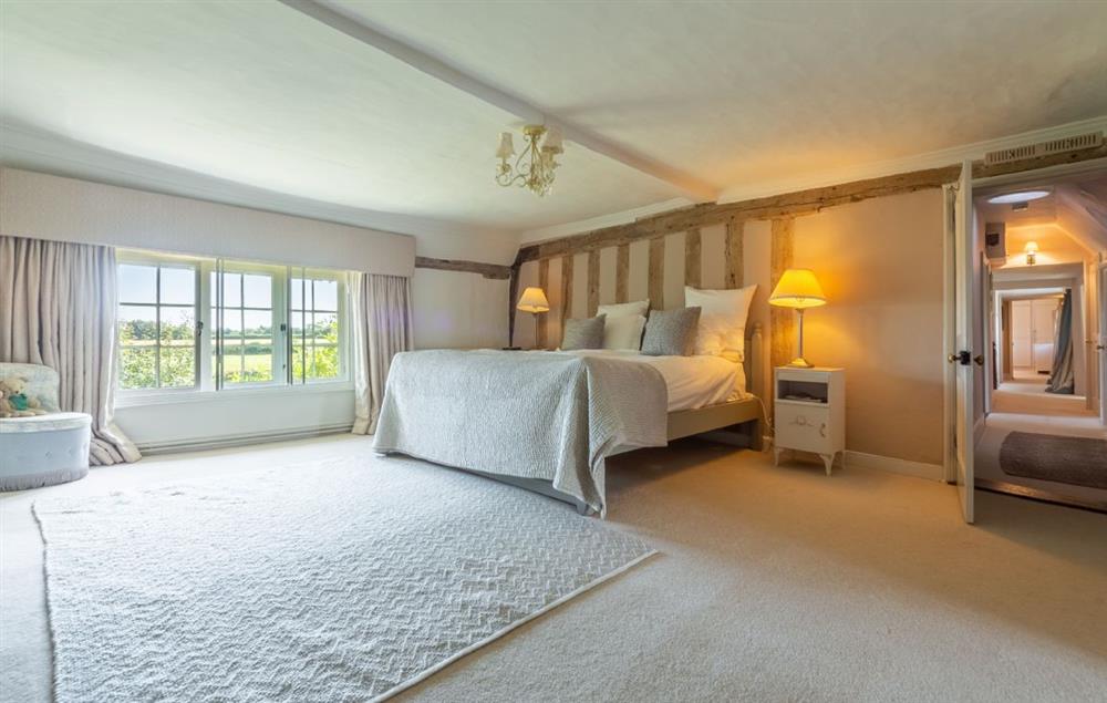 Master bedroom with en-suite bathroom at Cockerells Hall, Buxhall