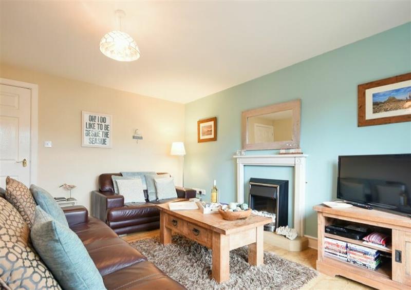 Enjoy the living room at Cockle Cottage, Seahouses