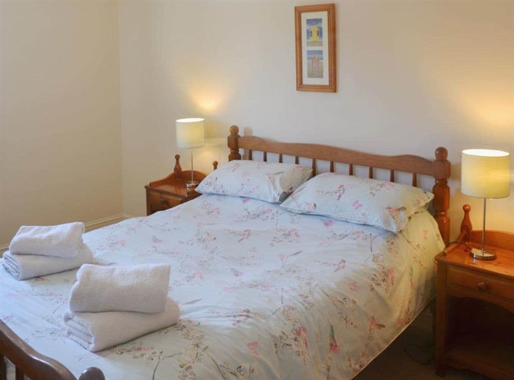Comfortable bedroom at Cockleshell Cottage in Sea Palling, Norfolk