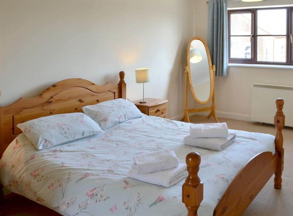 Comfortable double bedroom at Cockleshell Cottage in Sea Palling, Norfolk