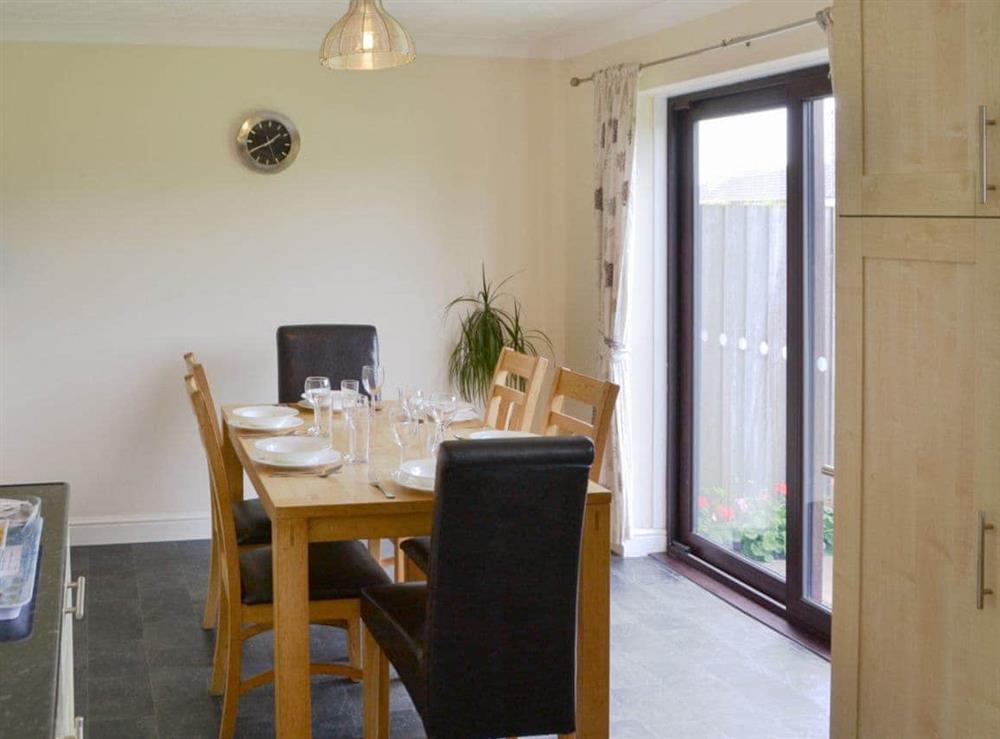 Dining area at Cockleshell Cottage in Sea Palling, Norfolk