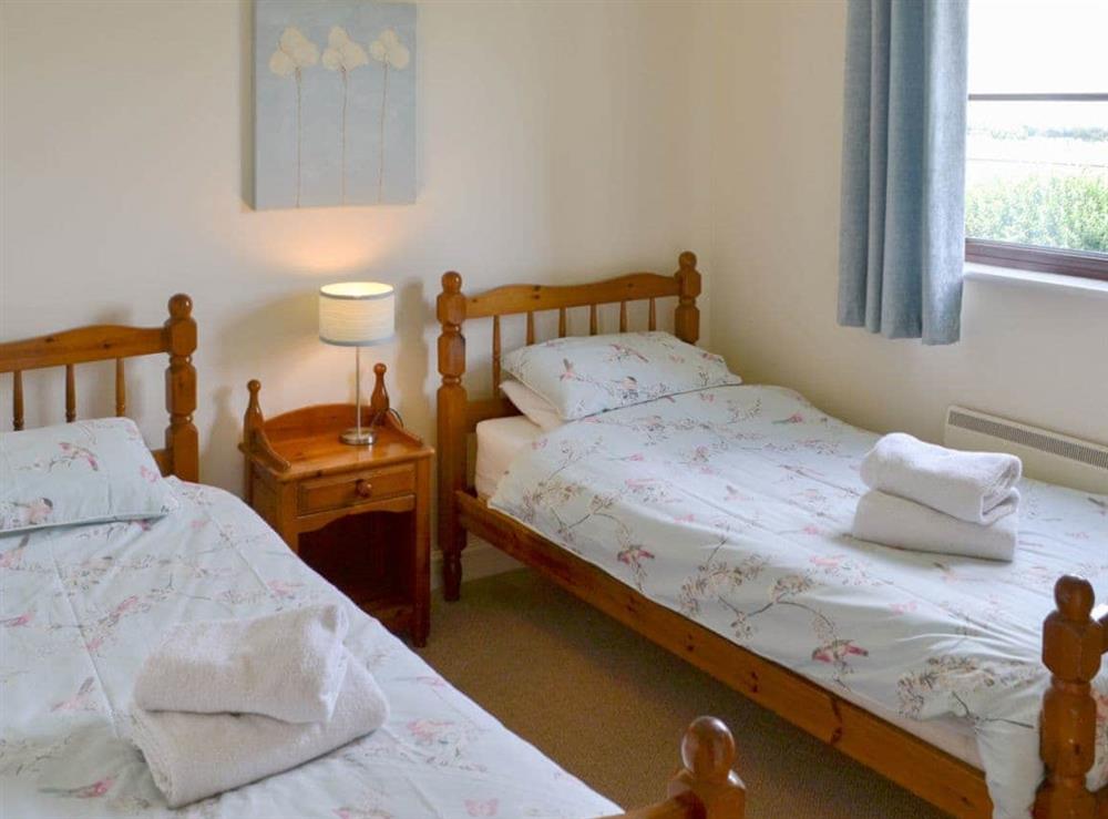 Twin bedroom at Cockleshell Cottage in Sea Palling, Norfolk