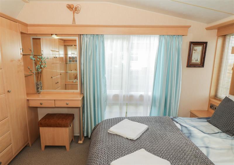A bedroom in Coed Llai Lodge (photo 2) at Coed Llai Lodge, Trearddur Bay
