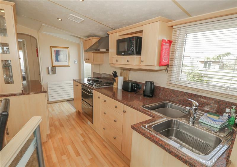 This is the kitchen at Coed Llai Lodge, Trearddur Bay