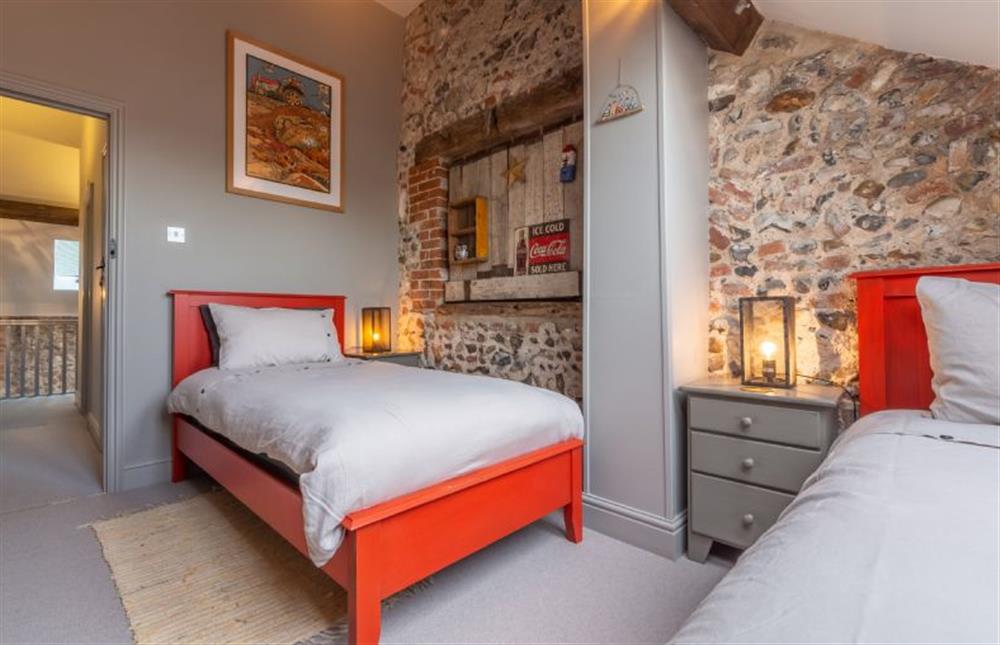 First floor: Bedroom three with twin beds at Cog Cottage, Great Walsingham