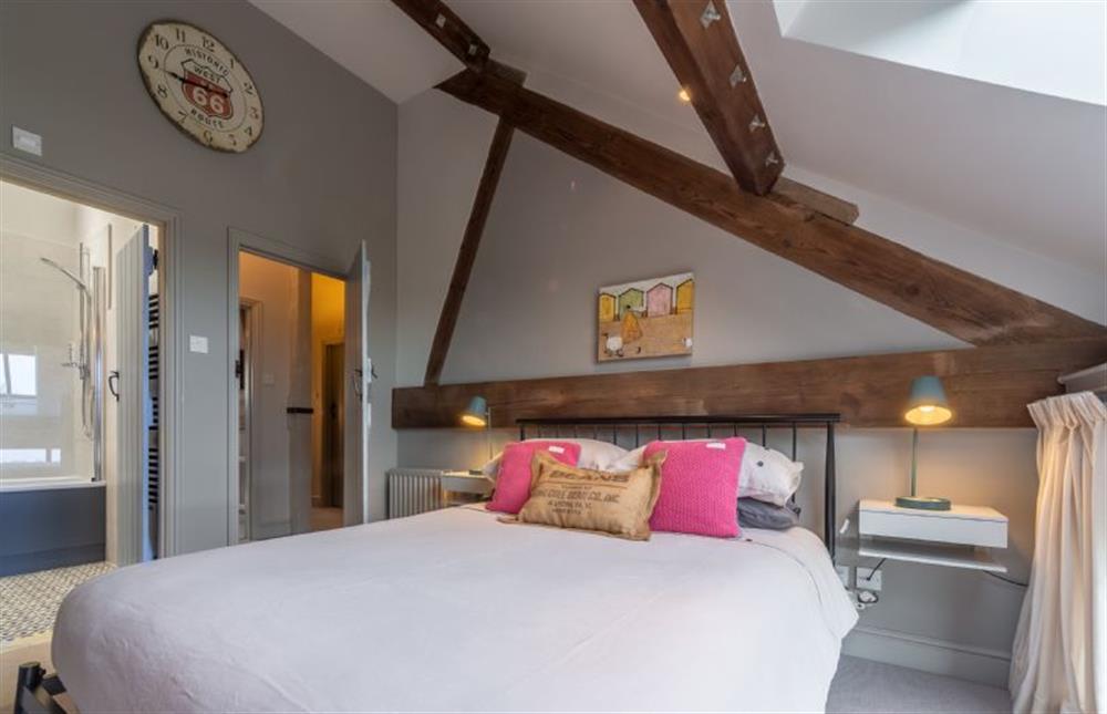 First floor: Master bedroom with door to en-suite at Cog Cottage, Great Walsingham