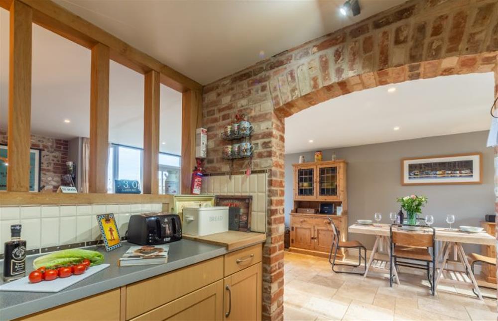 Ground floor: Kitchen with view to dining area at Cog Cottage, Great Walsingham