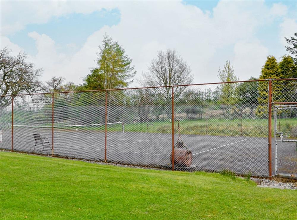 Private tennis court at Collalis in Gartocharn, near Balloch, Dumbartonshire