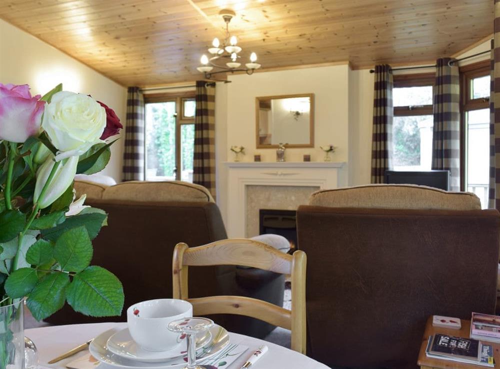 Charming living and dining room at Colman Brook Lodge in Corton, near Lowestoft, Suffolk
