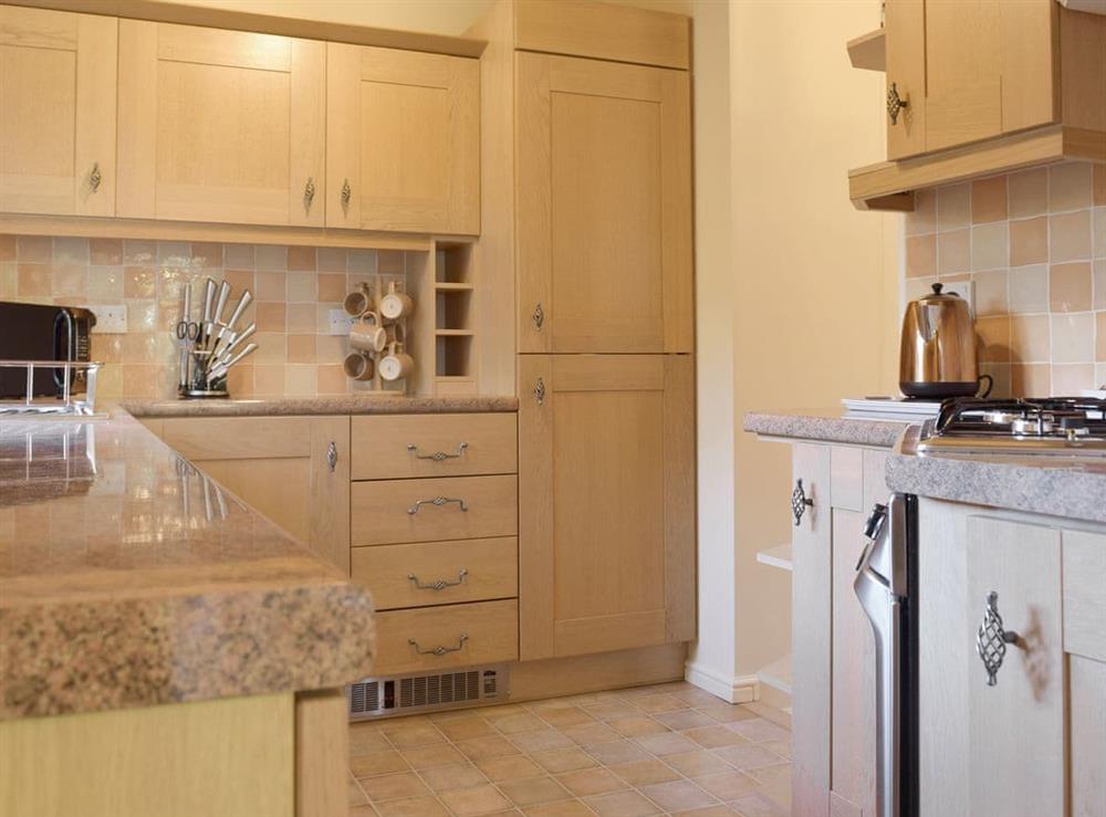 Well-equipped fitted kitchen at Colman Brook Lodge in Corton, near Lowestoft, Suffolk