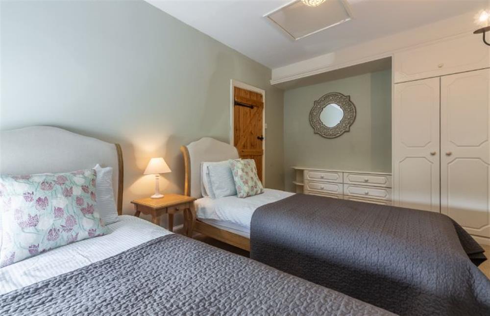 First floor: Bedroom two has full size twin beds (photo 2) at Columbine Cottage, Holme-next-the-Sea near Hunstanton