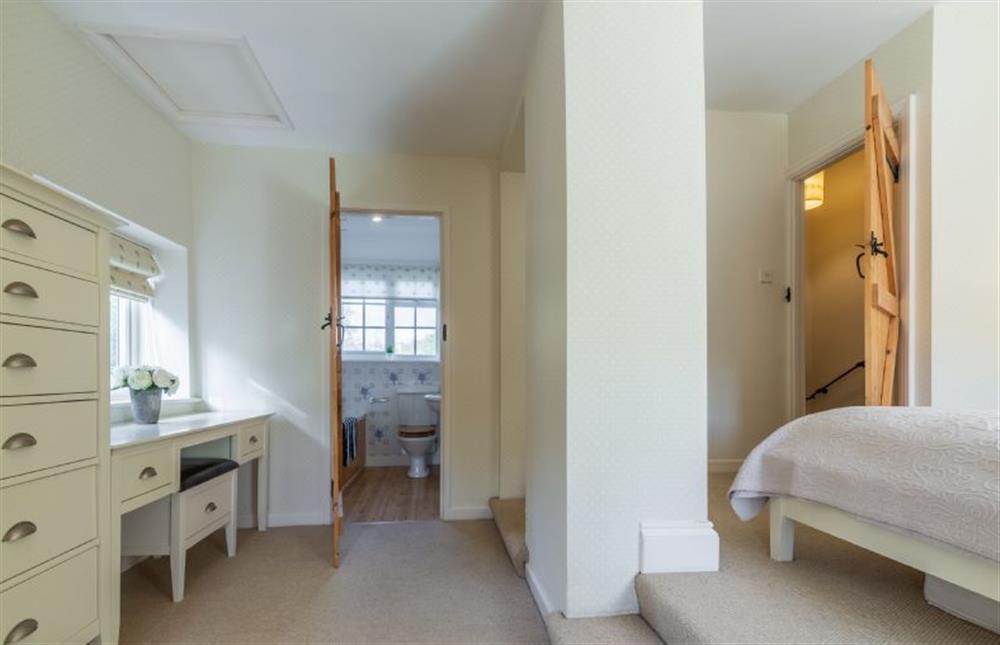 First floor: Master bedroom dressing area and en-suite at Columbine Cottage, Holme-next-the-Sea near Hunstanton