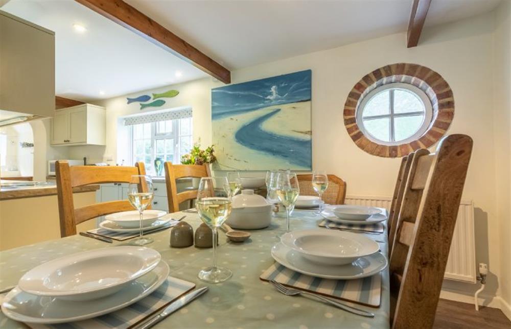 Ground floor: Dining table with seating for six at Columbine Cottage, Holme-next-the-Sea near Hunstanton