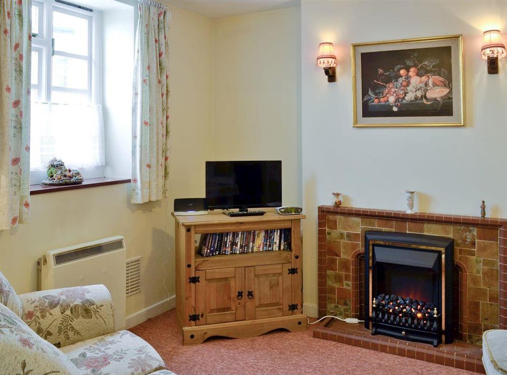 Cosy lounge area at Columbine Cottage in Ross-on-Wye, Herefordshire