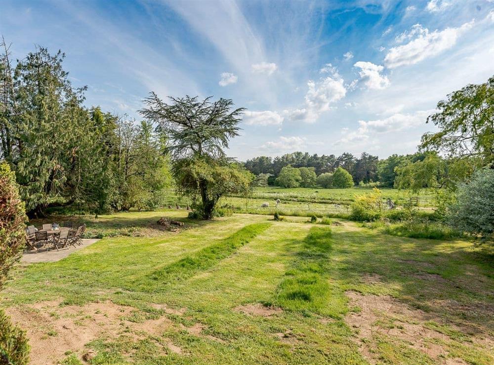 Beautiful large, enclosed, south-facing garden at Colveston Manor in Mundford, Norfolk