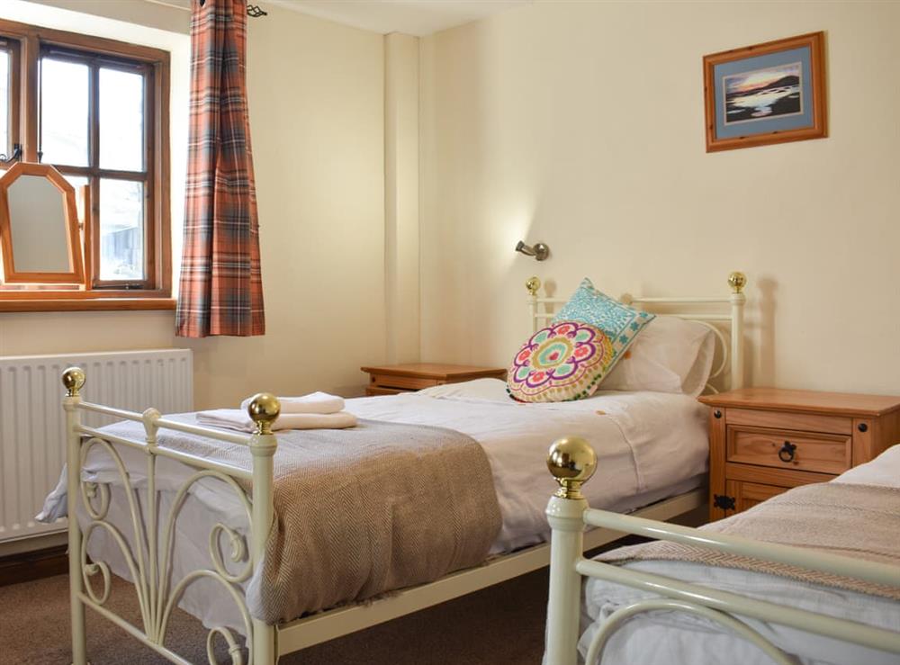 Twin bedroom at Combe Cottage in Near Tebay, Cumbria