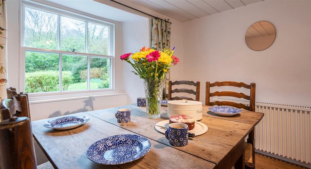 The spacious dining area at Combe Cottage in Nr. Bideford, Devon