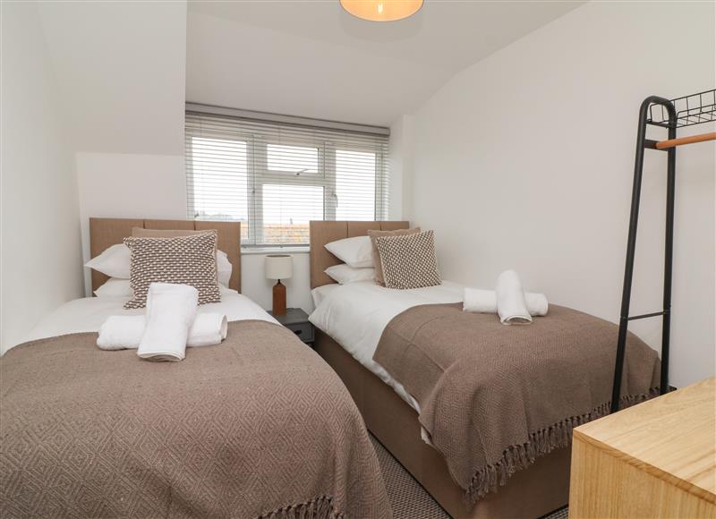 One of the bedrooms at Combe Hill Apartments, Ilfracombe