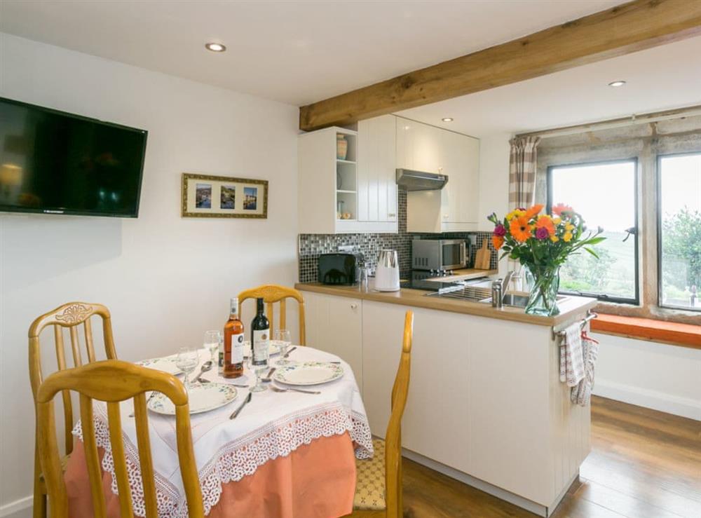 Charming dining area at Commons Farm Cottage in Wadsworth, near Hebden Bridge, West Yorkshire