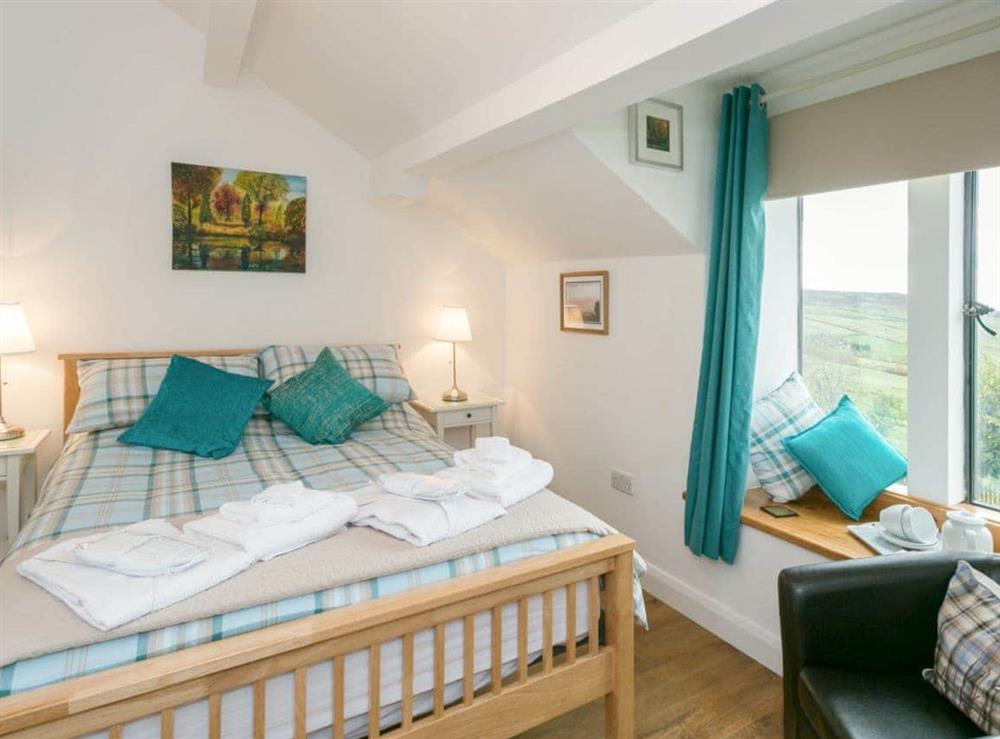 Comfortable double bedroom at Commons Farm Cottage in Wadsworth, near Hebden Bridge, West Yorkshire