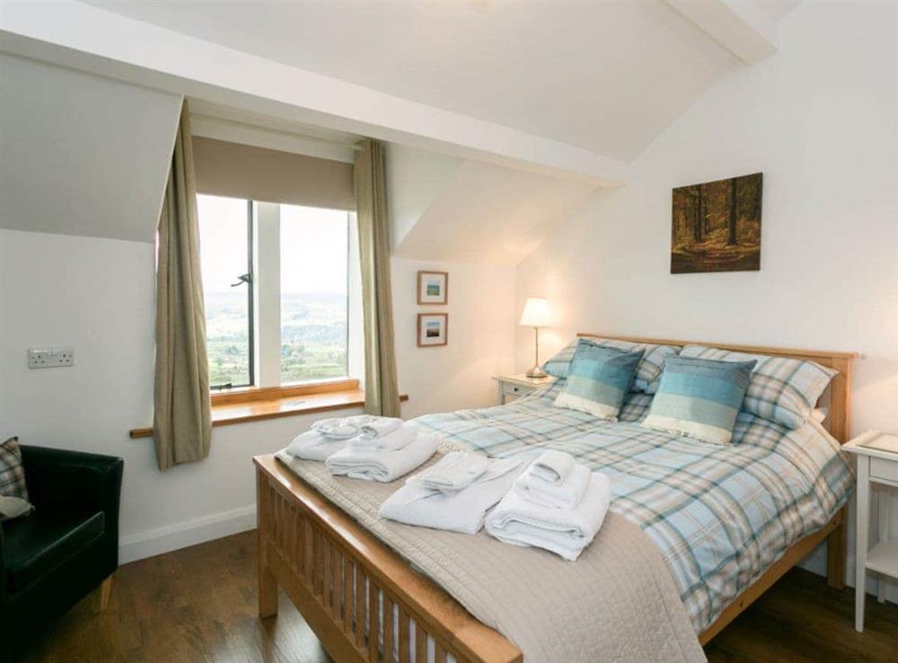 Spacious double bedroom (photo 2) at Commons Farm Cottage in Wadsworth, near Hebden Bridge, West Yorkshire