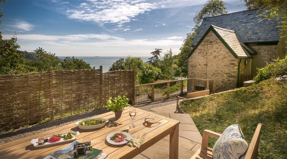 Outdoor seating (photo 2) at Compass Cottage in Dartmouth, Devon