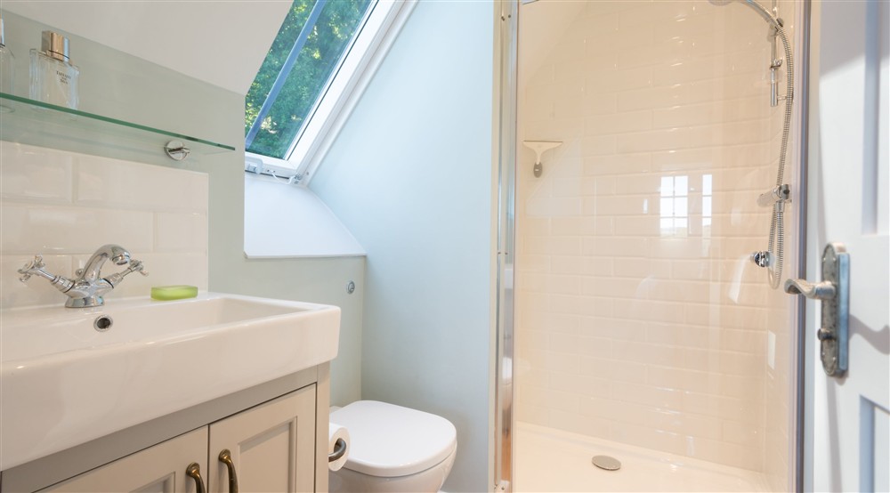 The en-suite shower room on the second floor of Compass Cottage, Devon at Compass Cottage in Dartmouth, Devon