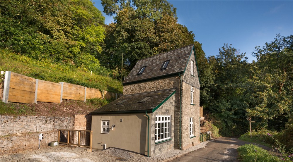The exterior of Compass Cottage and its parking spaces, Devon at Compass Cottage in Dartmouth, Devon