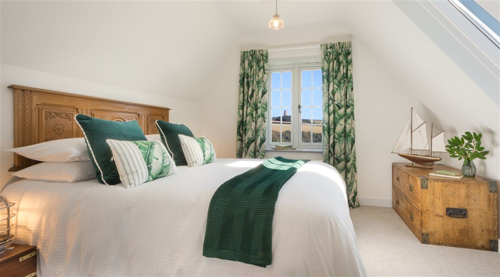 The second-floor double bedroom at Compass Cottage in Dartmouth, Devon