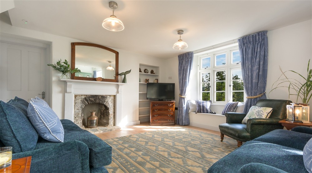 The sitting room area at Compass Cottage in Dartmouth, Devon