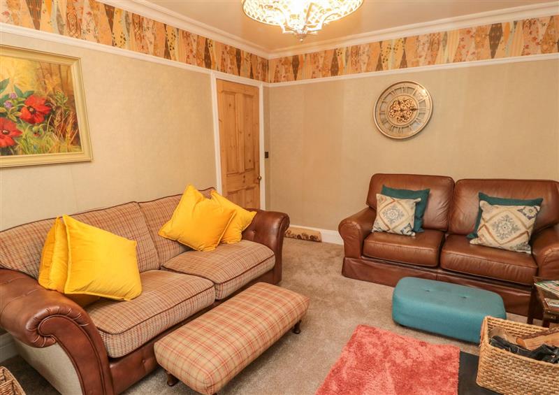 Relax in the living area (photo 2) at Compass Cottage, Wooler