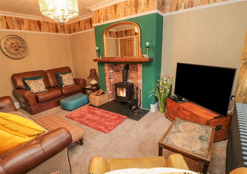 Relax in the living area at Compass Cottage, Wooler