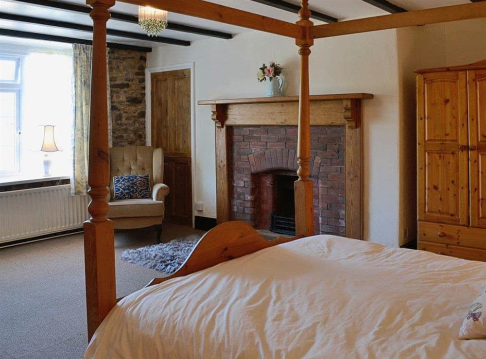 Four Poster bedroom (photo 2) at Conifers in Bish Mill, near South Molton, Devon